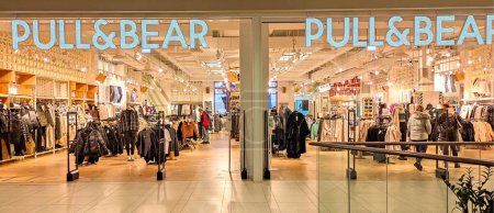 Photo for Poland, Bydgoszcz - November 24, 2022: Pull and Bear fashion store. Spanish clothing and accessories. Mannequins. Shop window - Royalty Free Image