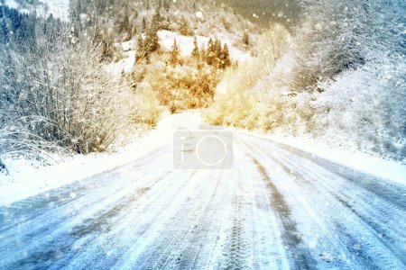 Photo for Snow covered road in the mountains on a snowy day - Royalty Free Image