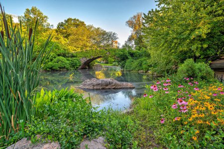 Photo for Gapstow Bridge in Central Park  in summer with flowers - Royalty Free Image