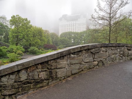 Photo for Gapstow Bridge in Central Park in late spring on foggy morning - Royalty Free Image