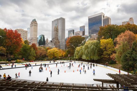 Photo for NEW YORK, USA - November 16, 2007. Outdoor ice skating rink in Central Park in Autumn, New York - Royalty Free Image