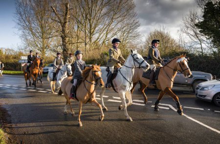 Photo for WINSLOW, UK - December 26, 2022. Girl and women riding horses, fox hunting in the traditional Boxing Day hunt, Bicester with Whaddon Chase Hunt, Buckinghamshire, UK - Royalty Free Image