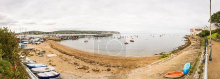 Panorama of fishing boats in harbour. Swanage Bay, Dorset, UK