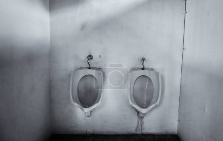 Photo for Detail of men's bathrooms on the street, privacy - Royalty Free Image