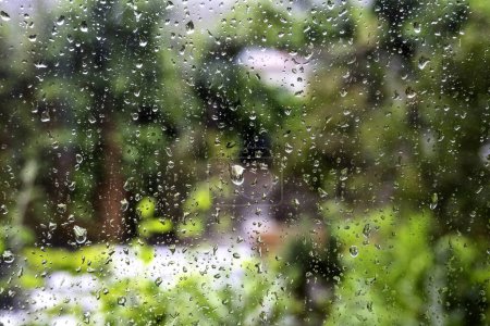 Photo for Detail of wet window on a cold rainy day in winter - Royalty Free Image