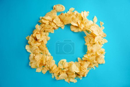 Photo for Fried foods are bad for your health. Healthy Eating. Chips, fried potatoes. Unhealthy foods. Blank space for text. - Royalty Free Image