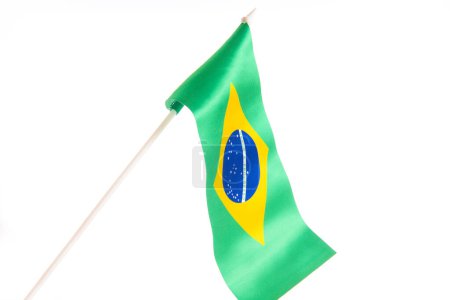 Photo for The Brazilian flag on a white background developing and fluttering in the wind. Isolate - Royalty Free Image