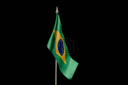 Photo for The Brazilian flag on a black background. - Royalty Free Image