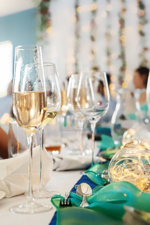 Photo for Glasses of red and white wine served by a professional catering company for a celebration event. High quality photo - Royalty Free Image