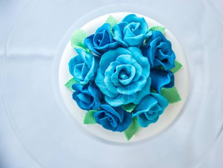 Photo for Wedding or birthday cake decorated with cream roses. High quality photo - Royalty Free Image