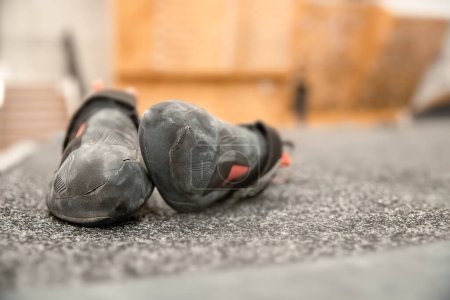Foto de Climbing shoes close up photo for indoor bouldering or gym climbing. High quality photo - Imagen libre de derechos