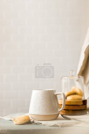 Photo for Cookies and morning drink coffee, milk or tea in light natural envoronment, kinfolk style breakfast. High quality photo - Royalty Free Image