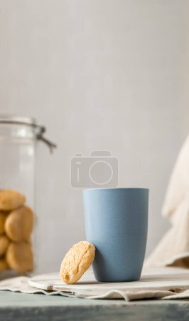 Photo for Cookies and morning drink coffee, milk or tea in light natural envoronment, kinfolk style breakfast. High quality photo - Royalty Free Image