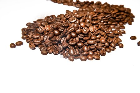 Photo for Fresh roasted dark brown coffee beans isolated over white background. High quality photo - Royalty Free Image