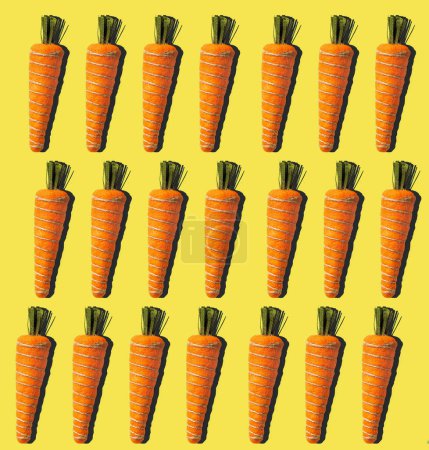 Photo for Toy carrot pattern over yellow background, Easter celebration, healthy eating concept. High quality photo - Royalty Free Image