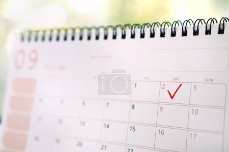 Photo for Calendar Adjustment Day, September 2. Desk September 2023 Calendar with marked date 2 September. - Royalty Free Image