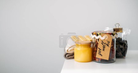 Photo for Get Well Soon Gifts kit with vitamins, honey, spices, wool socks, Cinnamon Sticks. Care package, gift box for a sick friend. Feel Better Gifts, Thinking of You, Encouragement Cheer Up Gifts box. - Royalty Free Image