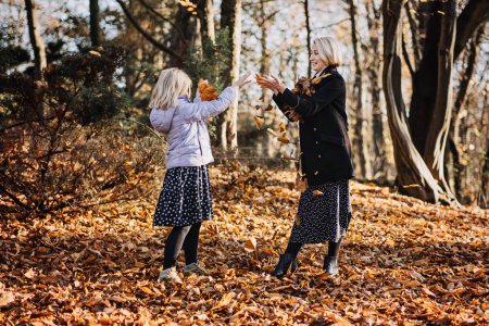 Photo for Relationship between mother and teenage daughter. Teens Health and Wellness Guiding teen through physical changes during adolescence. Happy Mother and teen girl daughter outdoor. - Royalty Free Image