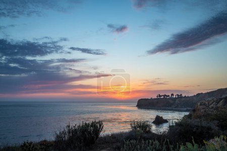 Breathtaking coastline view of Point Vicente and Pelican Cove at sunset with colorful clouds in the sky, Terranea Trail, Rancho Palos Verdes, California