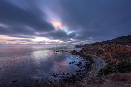 Gorgeous coastline view of Point Vicente and Pelican Cove after sunset with colorful clouds in the sky, Terranea Trail, Rancho Palos Verdes, California