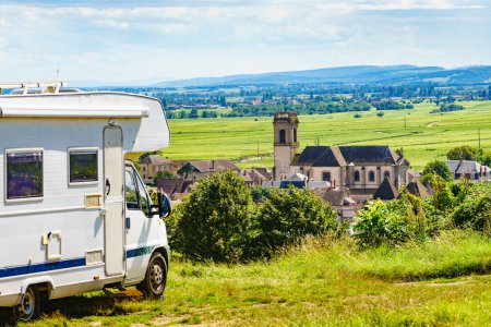 Camper rv visiting Pommard village in Burgundy, Cote de Beaune, Cote d'Or, France. Summer holidays, trip attraction with mobile home.