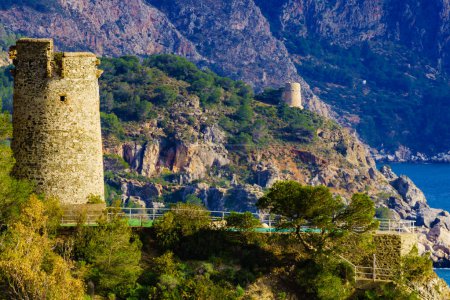 Coastal landscape with watchtower. Torre Del Pino, Pine tower on cliffs of Maro Cerro Gordo Natural Park, Malaga province, Costa Del Sol, Andalusia, Spain.