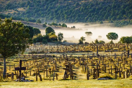 Hazy foggy weather in early morning over Sad Hill Cemetery in Burgos, Spain. Tourist place, spaghetti western film location.