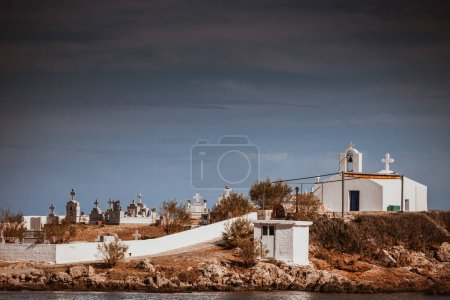 Agios Fokas near Monemvasia. Small cemetery graveyard on sea shore in Laconia region Peloponnese.