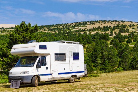 Caravan camping in mountains, Mont Ventoux, Provence region, southern France. Motorhome vacation.