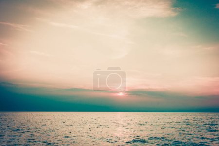 Colorful sunset over evening sea horizon, clouds sky. Tranquil scene. Natural background. Landscape. View from yacht