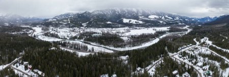 Photo for Elk Valley Fernie British Columbia Canada East Kootenay Region Winter Scene of River City and Canadian Rockies - Royalty Free Image
