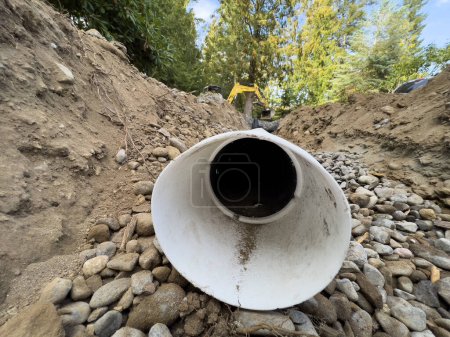 Photo for Installing Drainage - Close-up of Buried Water Pipe for Efficient Water Flow - Royalty Free Image