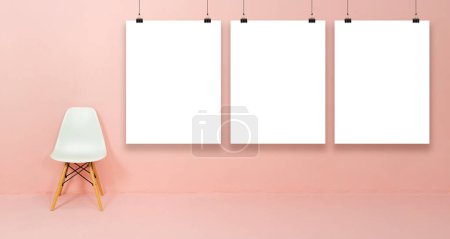 Photo for The white chair is set on the orange background, The sign has space for placing advertising text. - Royalty Free Image