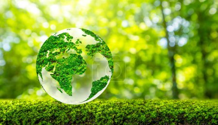 Foto de Concepto Salvar el mundo salvar el medio ambiente El mundo está en la hierba del fondo verde bokeh - Imagen libre de derechos