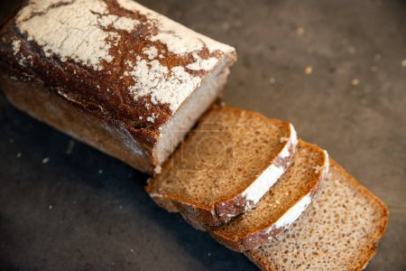 rye bread, sourdough, cut into pieces, placed on a stone counte
