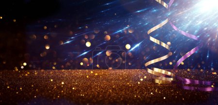 Photo for Background image of glowing light and party or celebration ribbons - Royalty Free Image