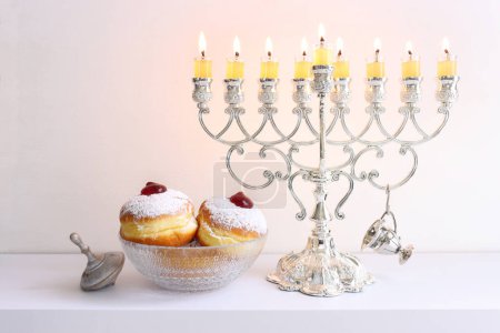 Photo for Religion image of jewish holiday Hanukkah background with menorah (traditional candelabra) and candles - Royalty Free Image