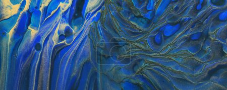 fotografía de arte de fondo efecto marmolizado abstracto con colores creativos azules y dorados. Hermosa pintura.