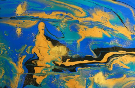 fotografía artística de fondo de efecto marmolizado abstracto con colores creativos azules, negros y amarillos. Hermosa pintura.