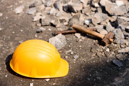 Safety Helmet in Construction Site. Yellow Hat. Safety Precautions Measures in Industrial workplace Background Concepts.