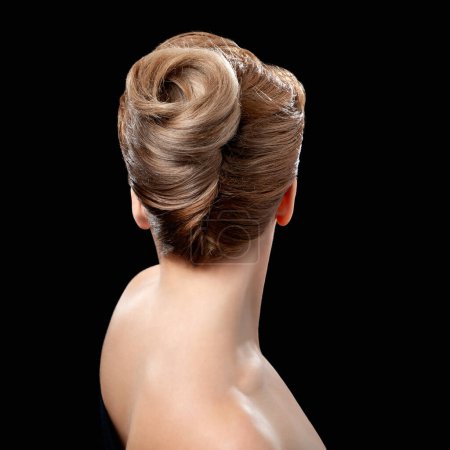 Photo for Back view of young woman. Portrait of a nude young white blonde woman. Blond styled hair. Stylish hairstyle. Isolated on a black background - Royalty Free Image