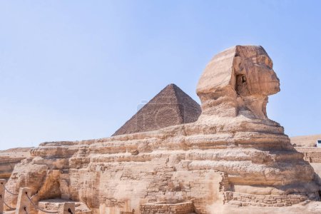 Stand in awe of the iconic Sphinx, the enigmatic guardian of Egypt's ancient secrets. This photograph captures the majesty and mystique of this timeless monument, which has witnessed millennia of history. Ideal for history buffs, travelers, and lover