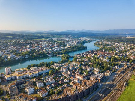 Photo for Aerial image of Rheinfelden towns in Switzerland and Germany connected with a bridge over the river Rhine - Royalty Free Image