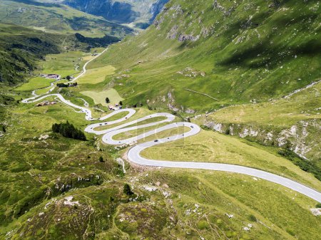 Photo for Drone image over the serpentine road through the Swiss Alps Julier Pass in summer - Royalty Free Image