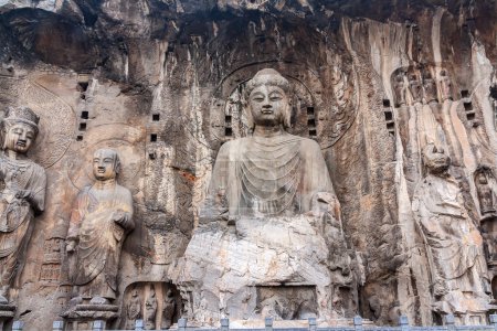 Photo for Buddhist statues in Longmen Grottoes. China. This large grotto group was started from 494 AC finished about 644 AC. - Royalty Free Image
