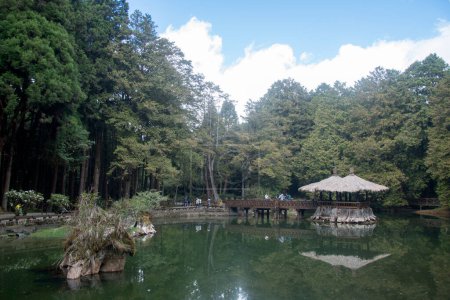 Photo for Alishan, Taiwan- 7 Dec, 2022: Landscape of Sister ponds in Alishan National Forest Recreation Area in Taiwan. It is composed by two high mountain ponds above 2100 meters sea level - Royalty Free Image