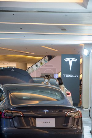 Photo for Bangkok, Thailand- 15 Feb, 2023: Tesla electric cars display on the showroom in the shopping mall, Bangkok. esla designs and manufactures electric vehicles - Royalty Free Image