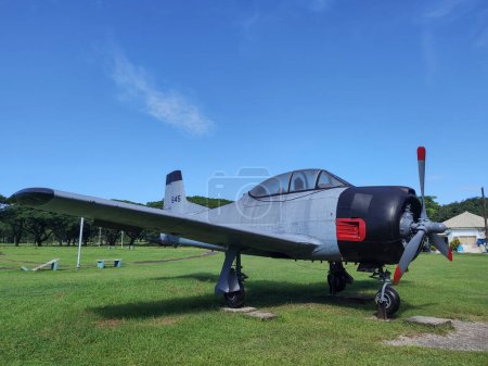 Photo for Clark Freeport, Philippines- 20 Oct 2023: T-28 Trojan  (Tora-Tora) model displayed in the Air Force City Park in Clark, Philippines. It is a showcase of the history of Philippines Air Force through a variety of aircrafts - Royalty Free Image