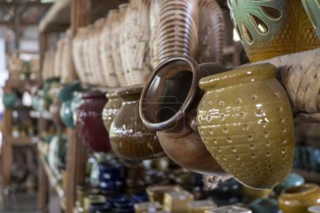 Photo for Colorful pottery from a local craft store on display - Royalty Free Image