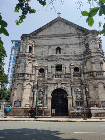 Foto de Manila, Filipinas-14 Oct 2023: Iglesia parroquial Nuestra Señora de los Remedios en Manila. Cuenta con arquitectura de estilo barroco mexicano, fue completado en 1864. - Imagen libre de derechos